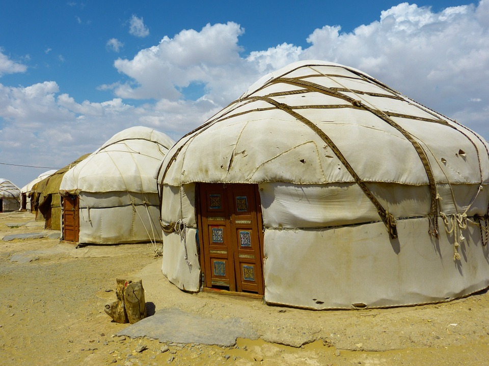 Yurt tents on an open space
