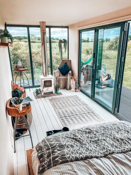 A tiny home with glass sliding doors